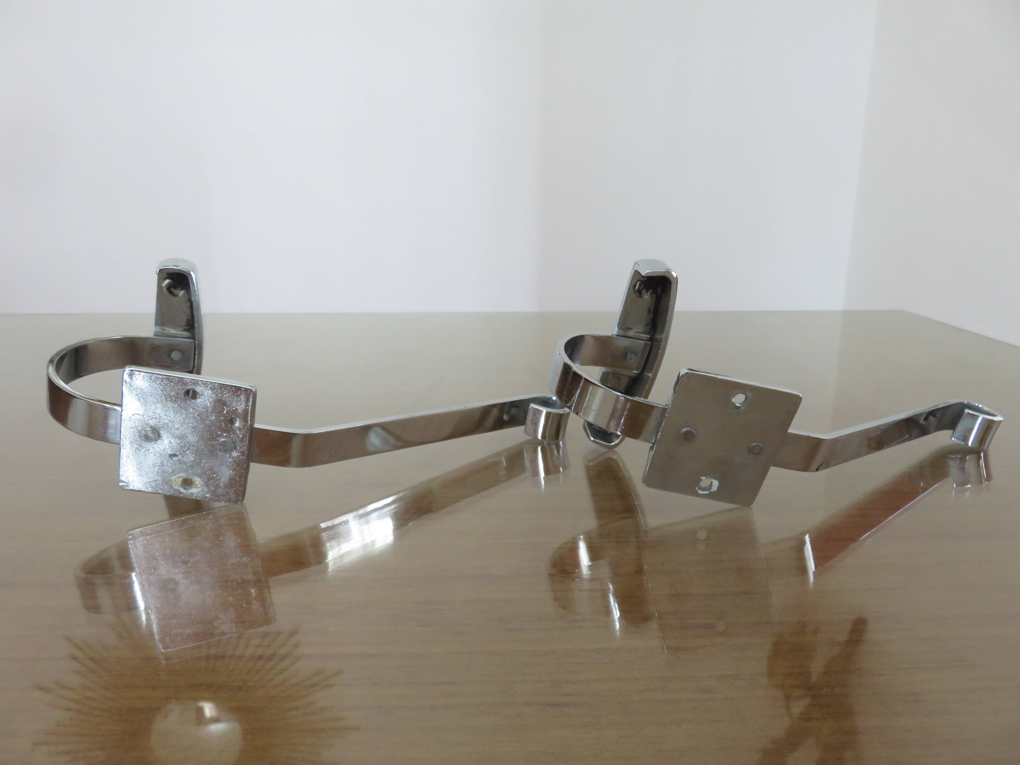 Pair of chrome metal coat hooks from the 1970s.