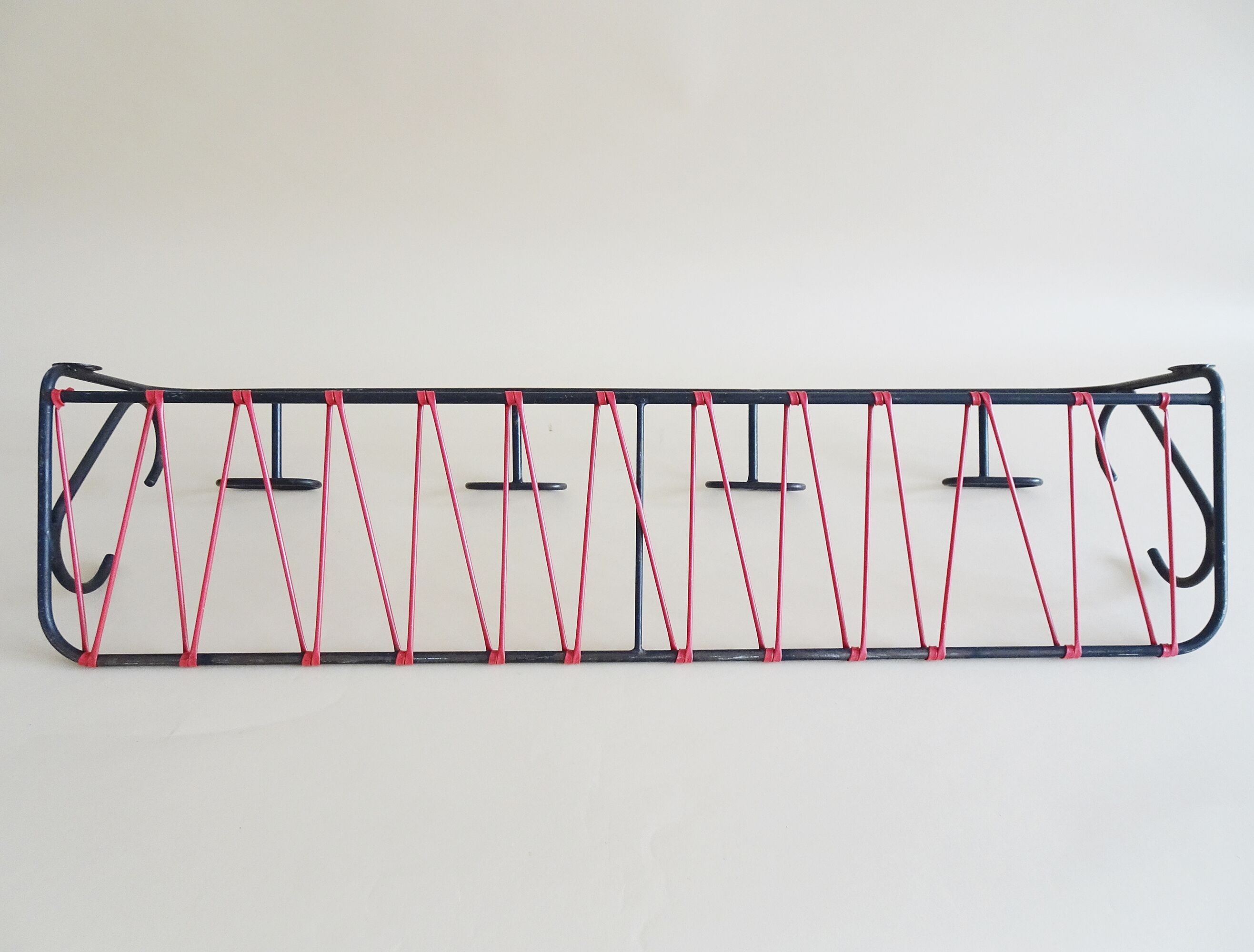 Minimalist wall coat rack in string design in black and red