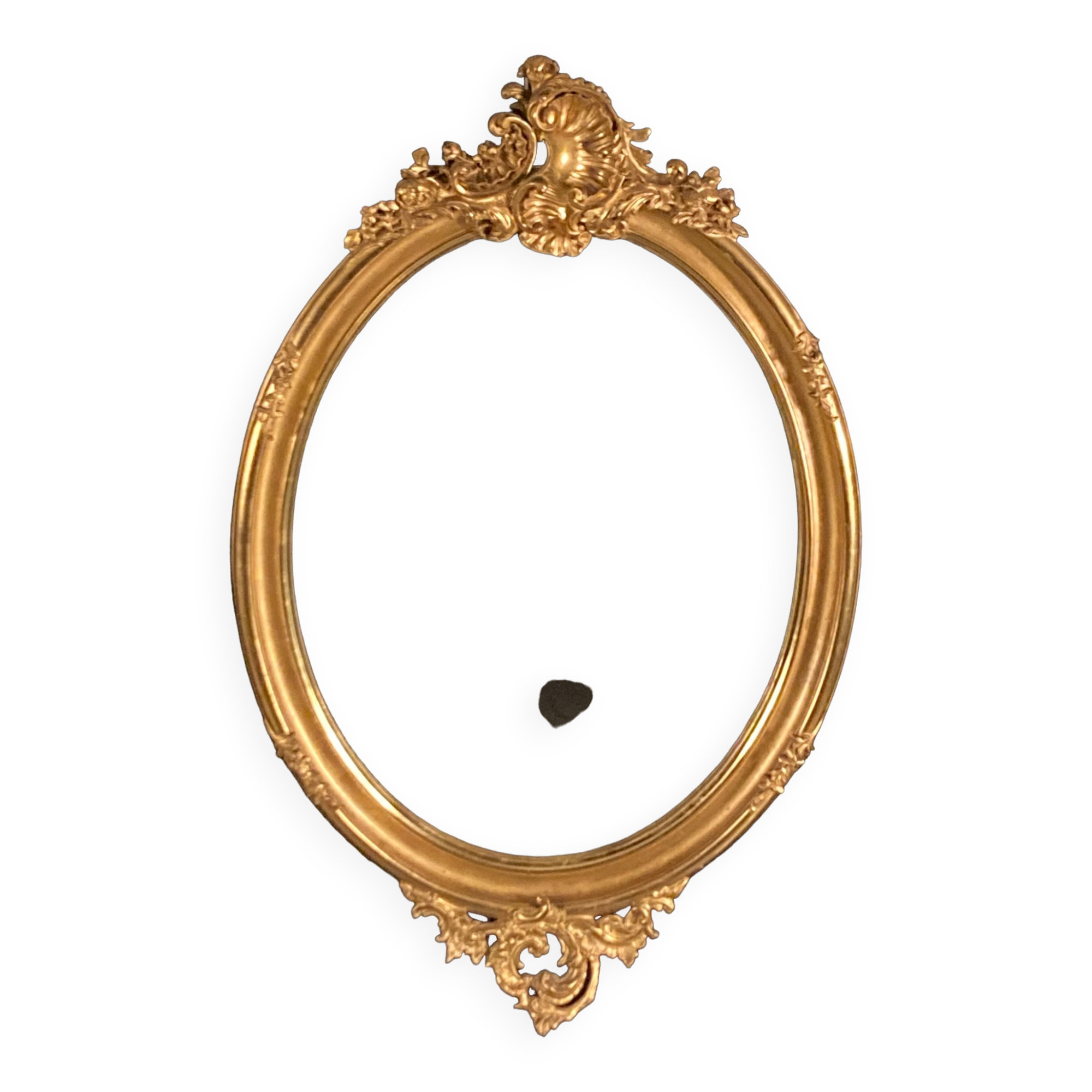 Large oval mirror in gilded wood