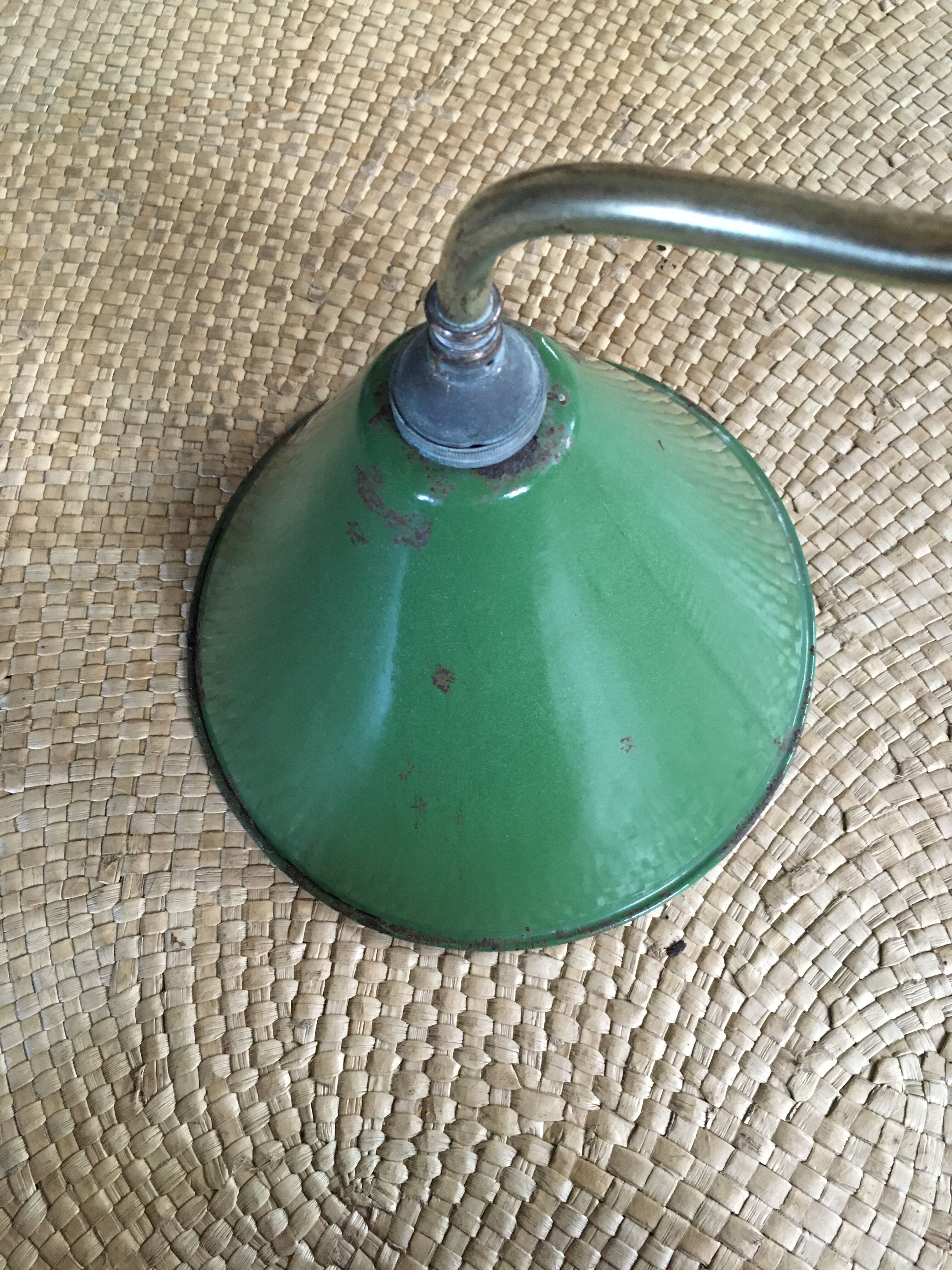 Enamelled sheet metal wall light