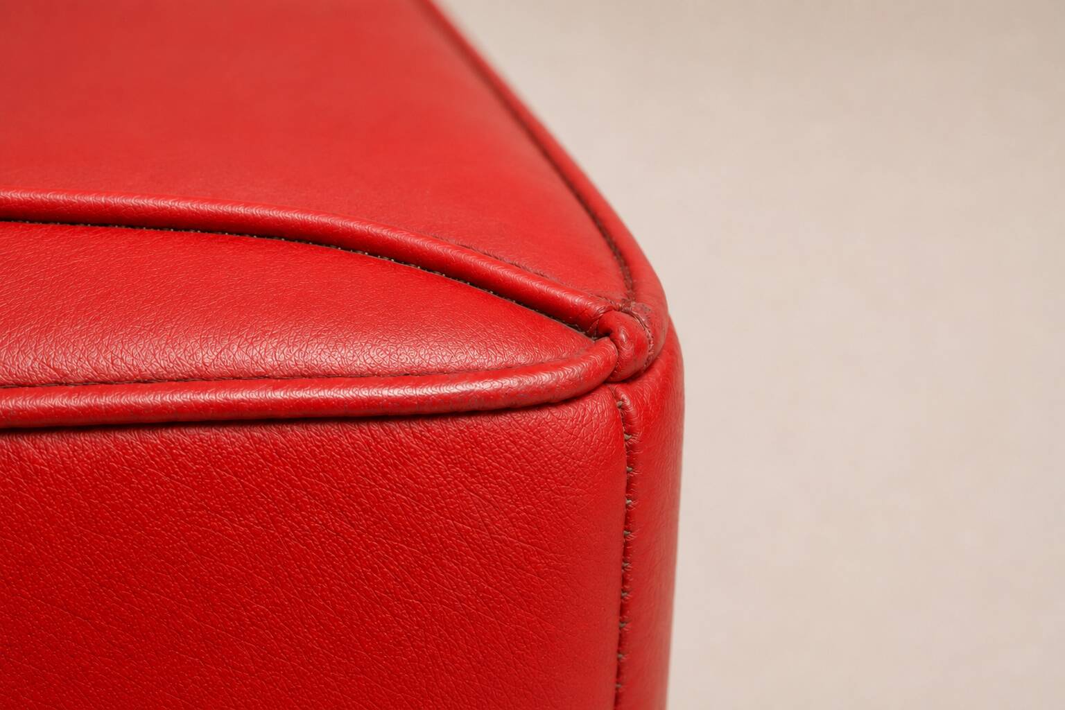 Uchida x Poltrona Frau — Pair of "Moji" armchairs in red leather