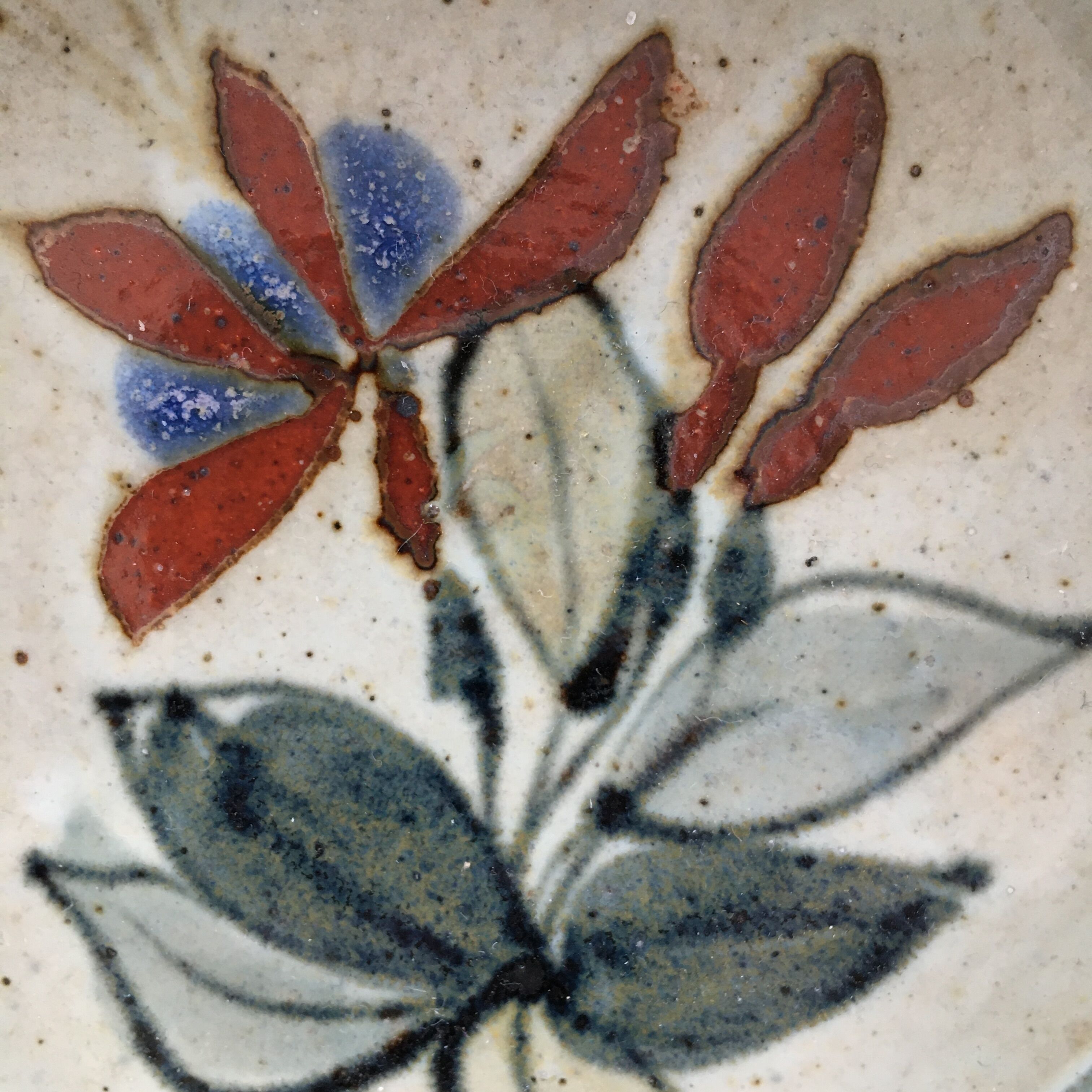 Floral decorated ramekin, signed