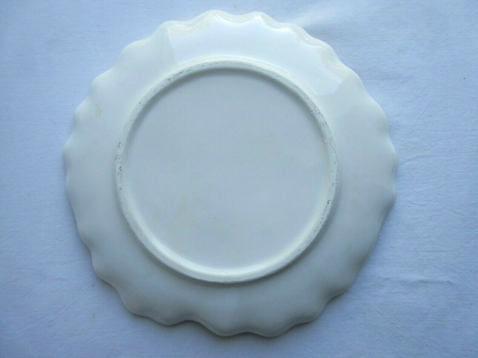 Decorative plate in earthenware dabbling: Orange thought with a yellow heart