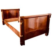 Empire-style mahogany bed