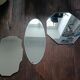 Three beveled mirrors