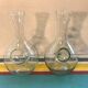 Paire de carafes rafraîchissoirs en verre