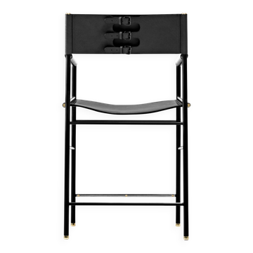 Contemporary bar stool with a black metal backrest and black rubber.