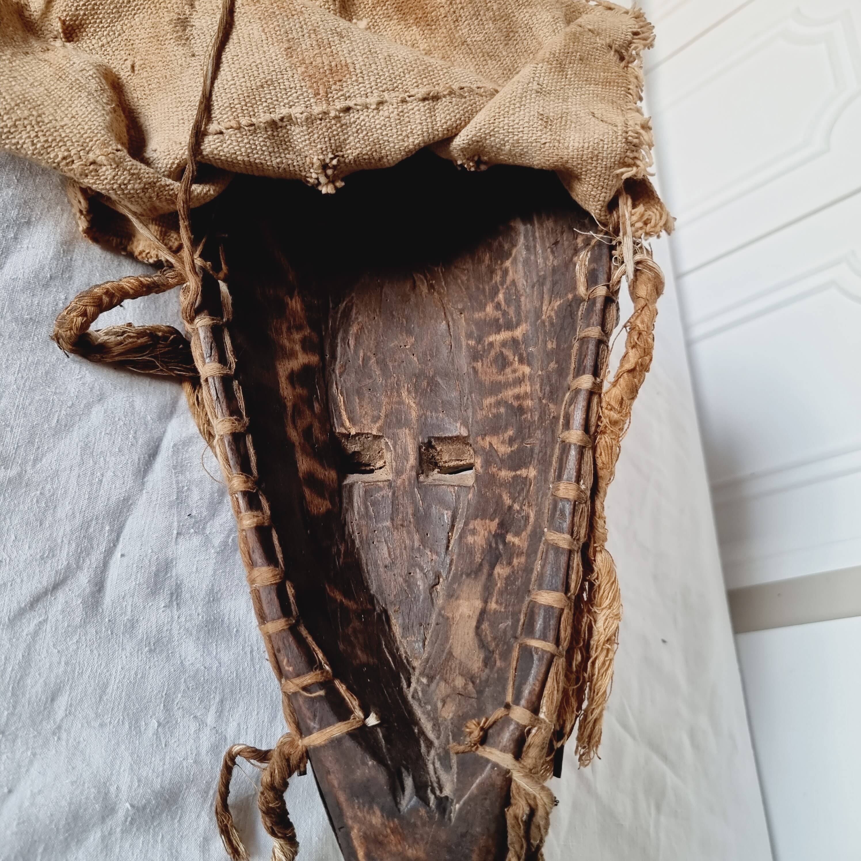 African mask from Mali from the N'Tomo tribe of Marka covered in chiseled brass