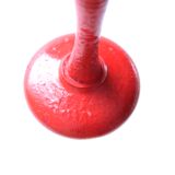 Red wooden hat rack from the 1930s