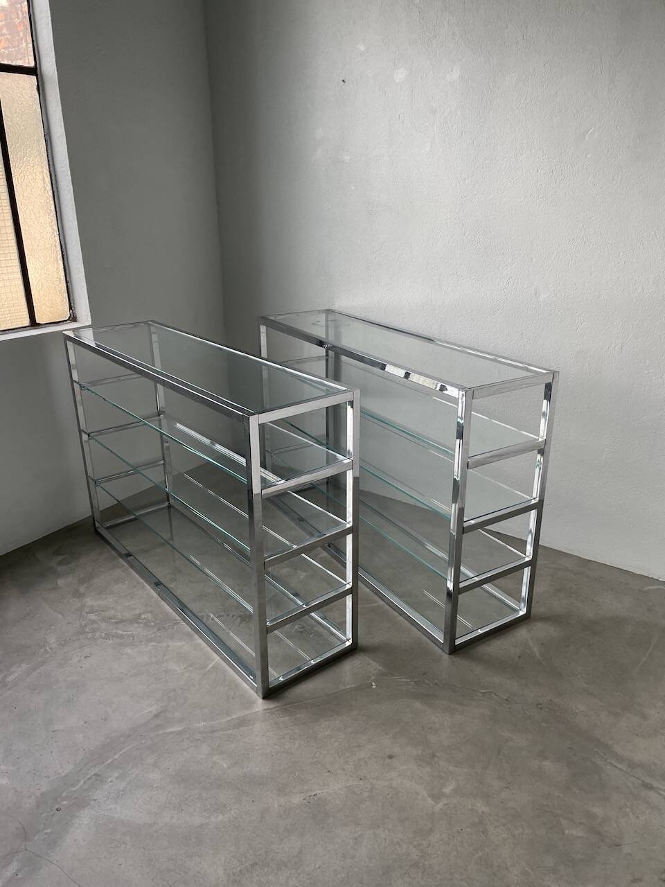 Pair of chrome and glass shelves from the 70s