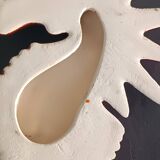 Two vintage ceramic wall pots featuring a seahorse and a starfish.