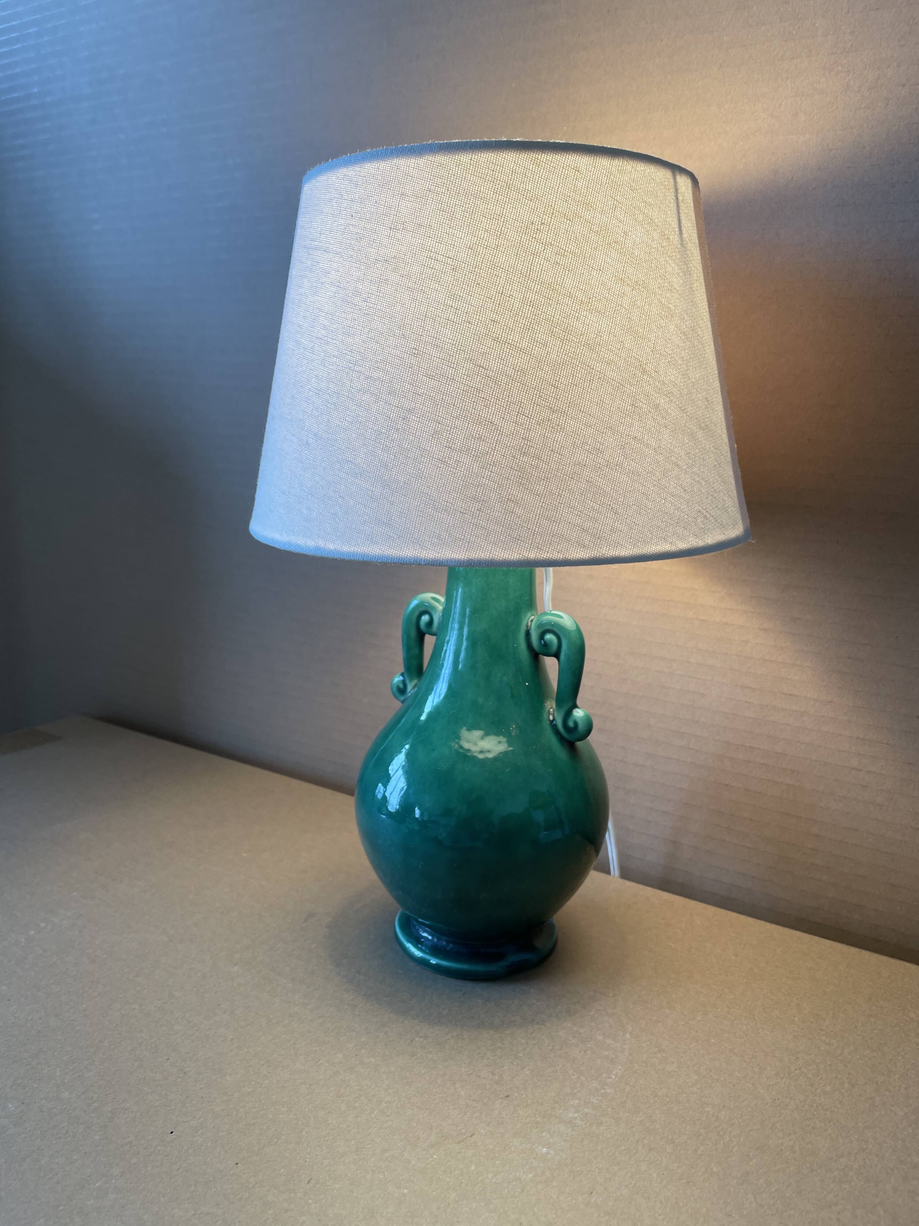 Old green ceramic lamp