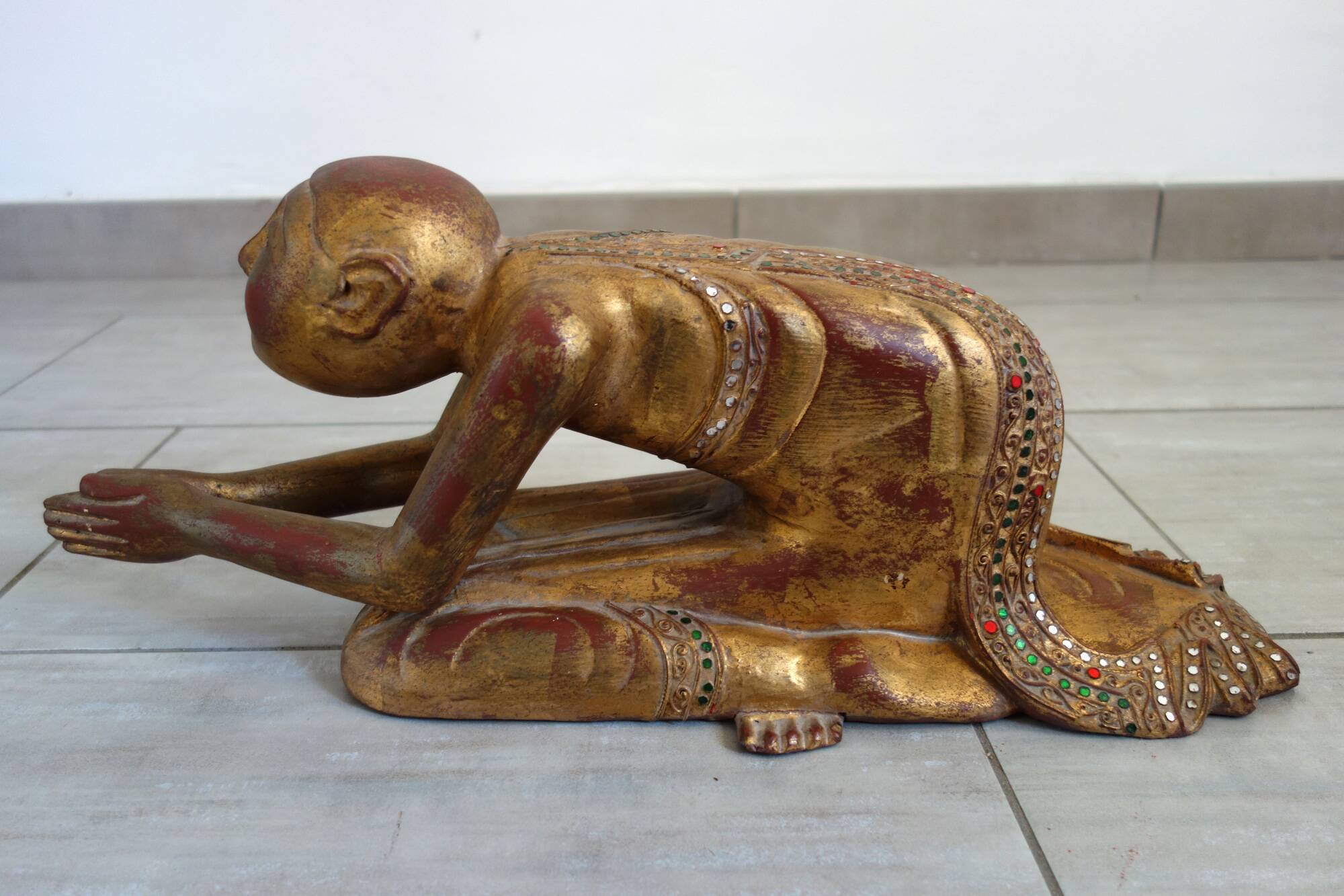 Burmese Buddhist monk statue in prayer, 19th century.