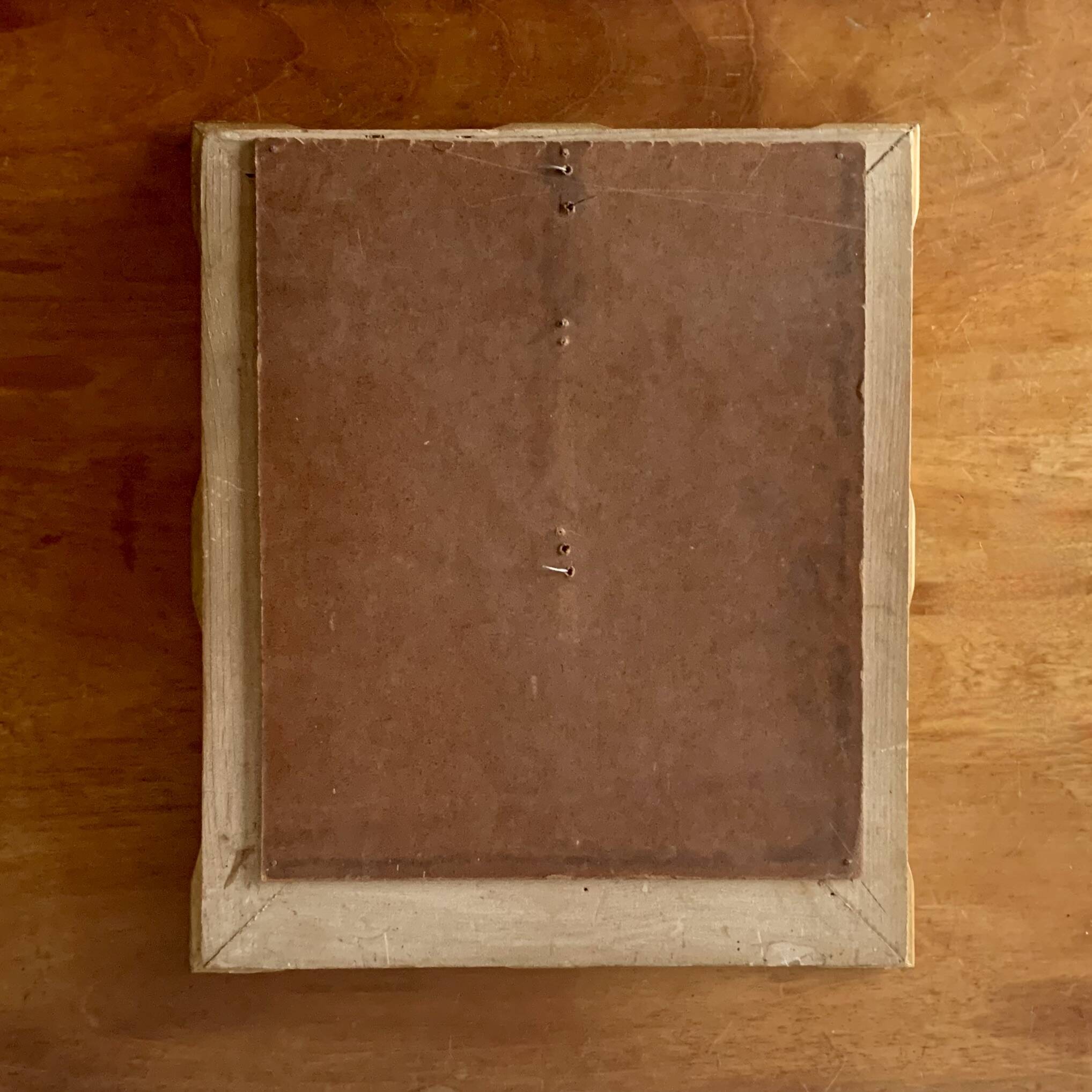 Old gilded carved wooden wall frame