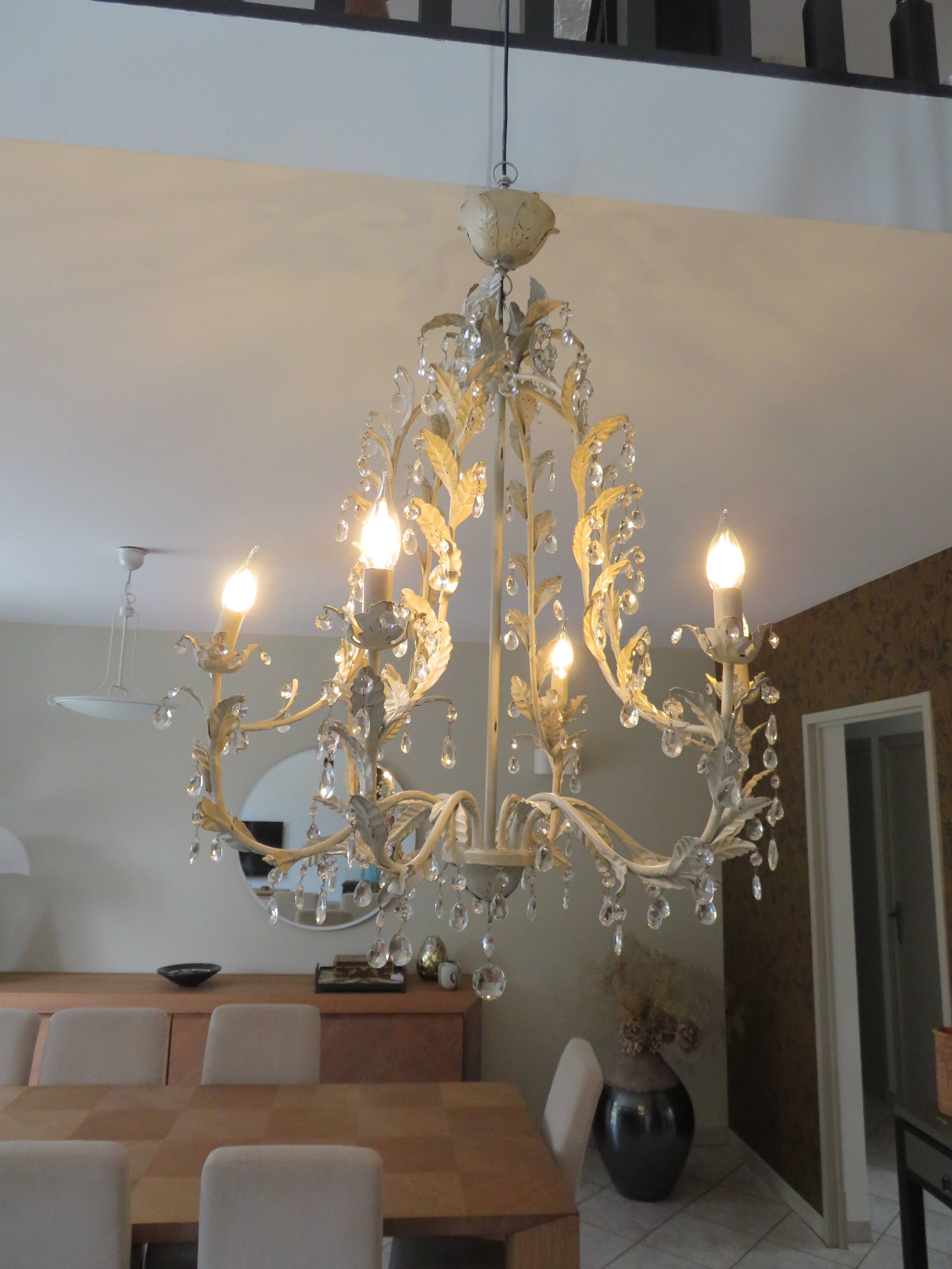 Large cage chandelier in aged metal.