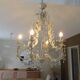 Large cage chandelier in aged metal.