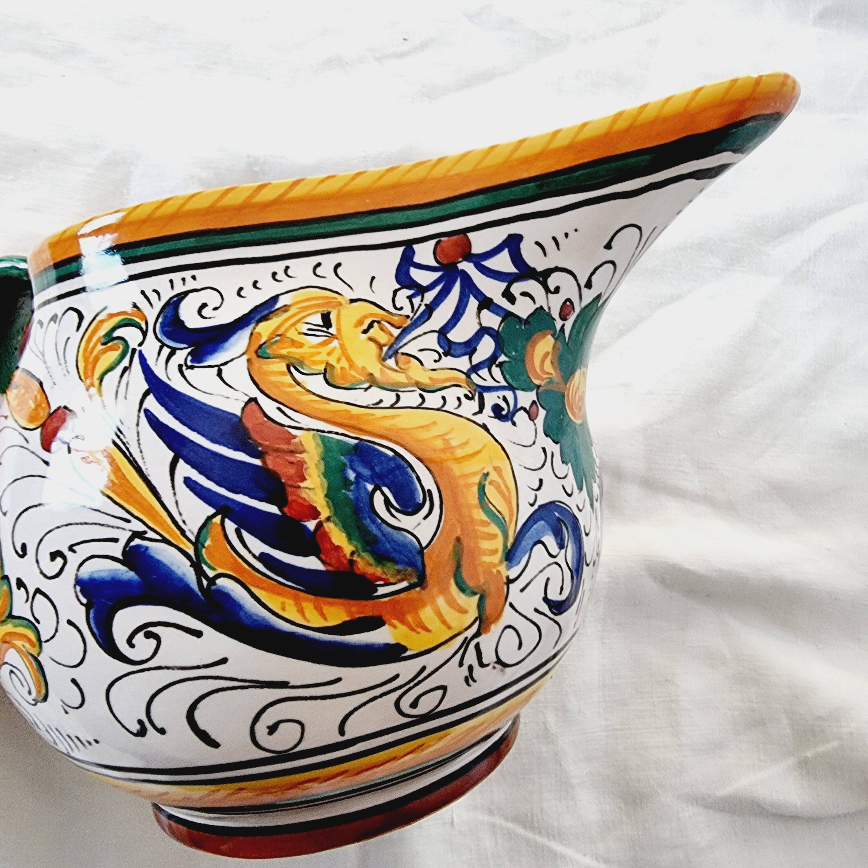 Majolica ceramic jug by R. Deruta, Italy, hand-painted, with a long spout.  Decorated with a dragon tree