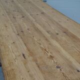 Old canteen in pine table