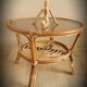 Light rattan lounge table and smoked glass