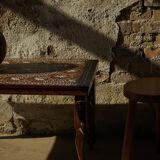Vintage Indian teak coffee table inlaid with elephant motifs, mid-20th century.