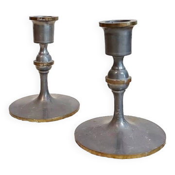Pair of pewter candle holders