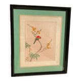 Bird painting on a branch