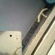 Former Wall coat hangers painted in gray iron