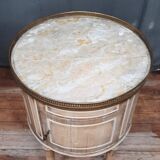 Round bedside table painted in trompe l'oeil