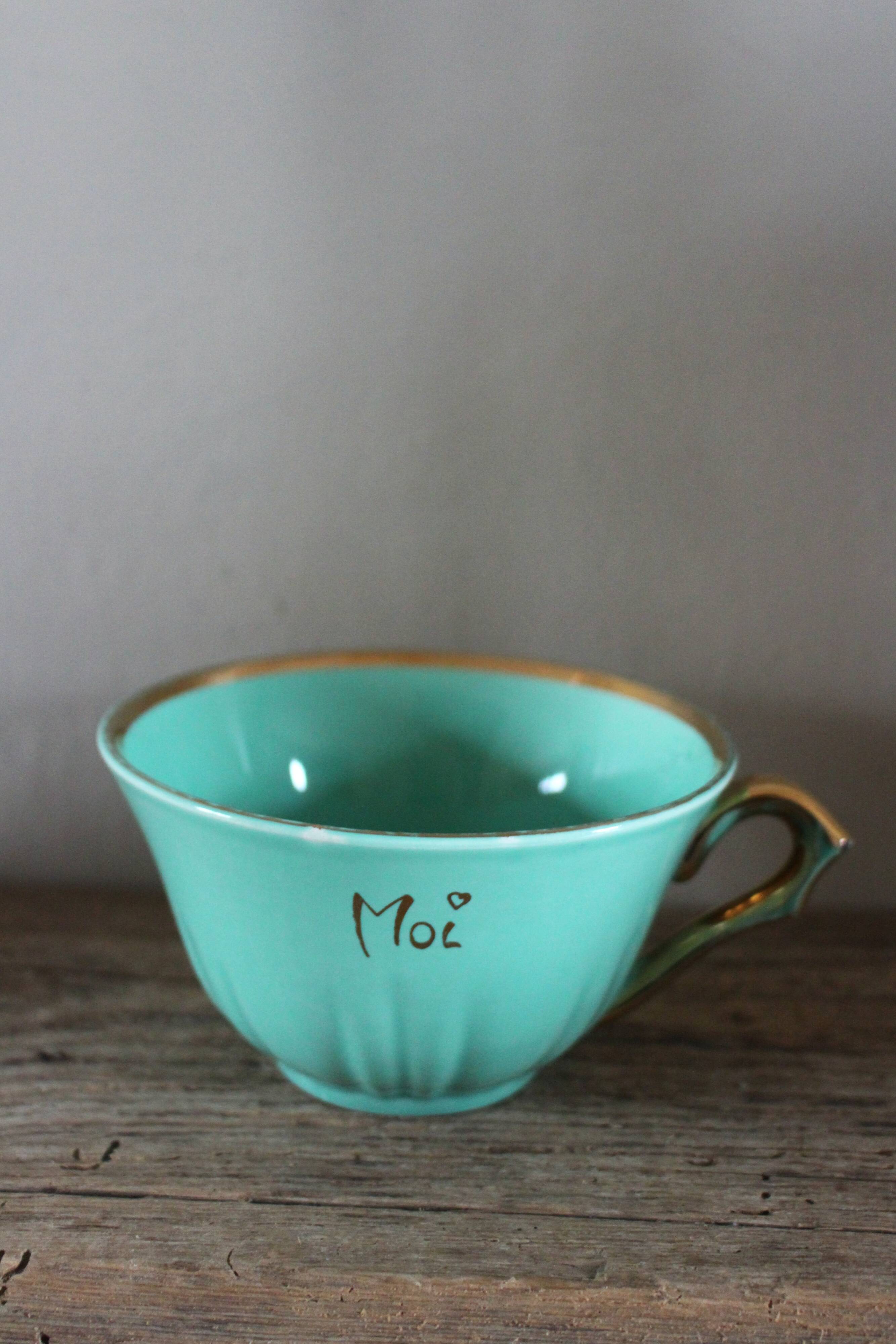 Green and gold cup from the Moi Salins collection.
