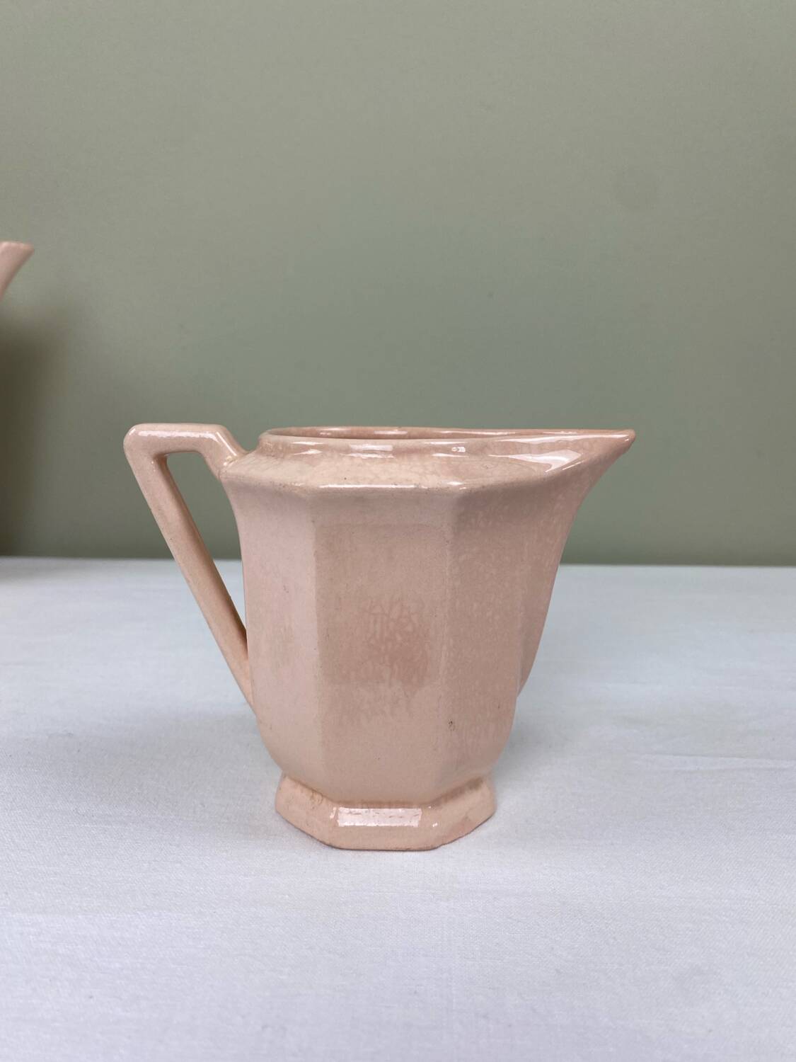 Antique milk jug