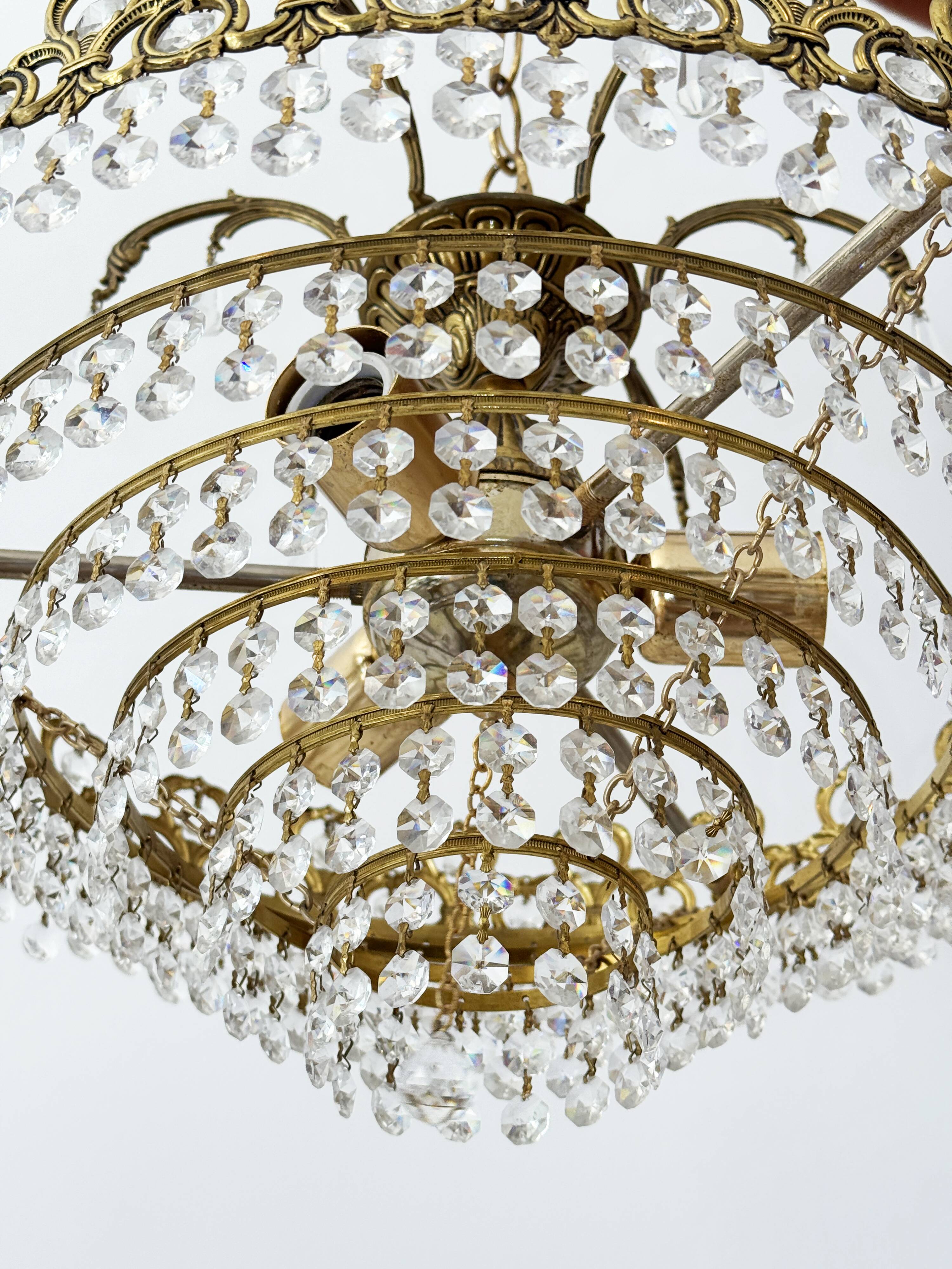 Brass and cut crystal basket chandelier, Empire style.