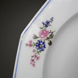 4 flat plates by Bernardaud, Limoges porcelain, floral decoration from the 1920s to 1950s.