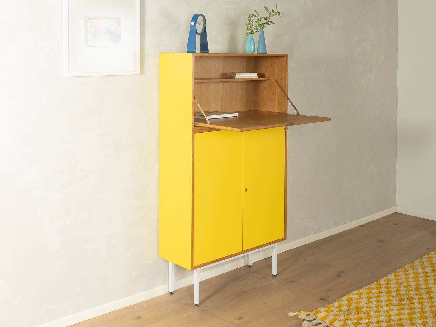 Classic sideboard from the 1960s, oak veneer, yellow Resopal, white steel feet
