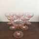 Champagne glass in pink glass with floral engraving