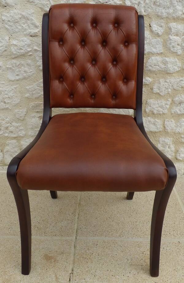 Chic Vintage Chesterfield style chair with wooden frame and faux leather