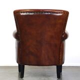sheepskin armchair with a beautiful finish and deep color