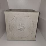 Square planter with a patinated iron lion's head