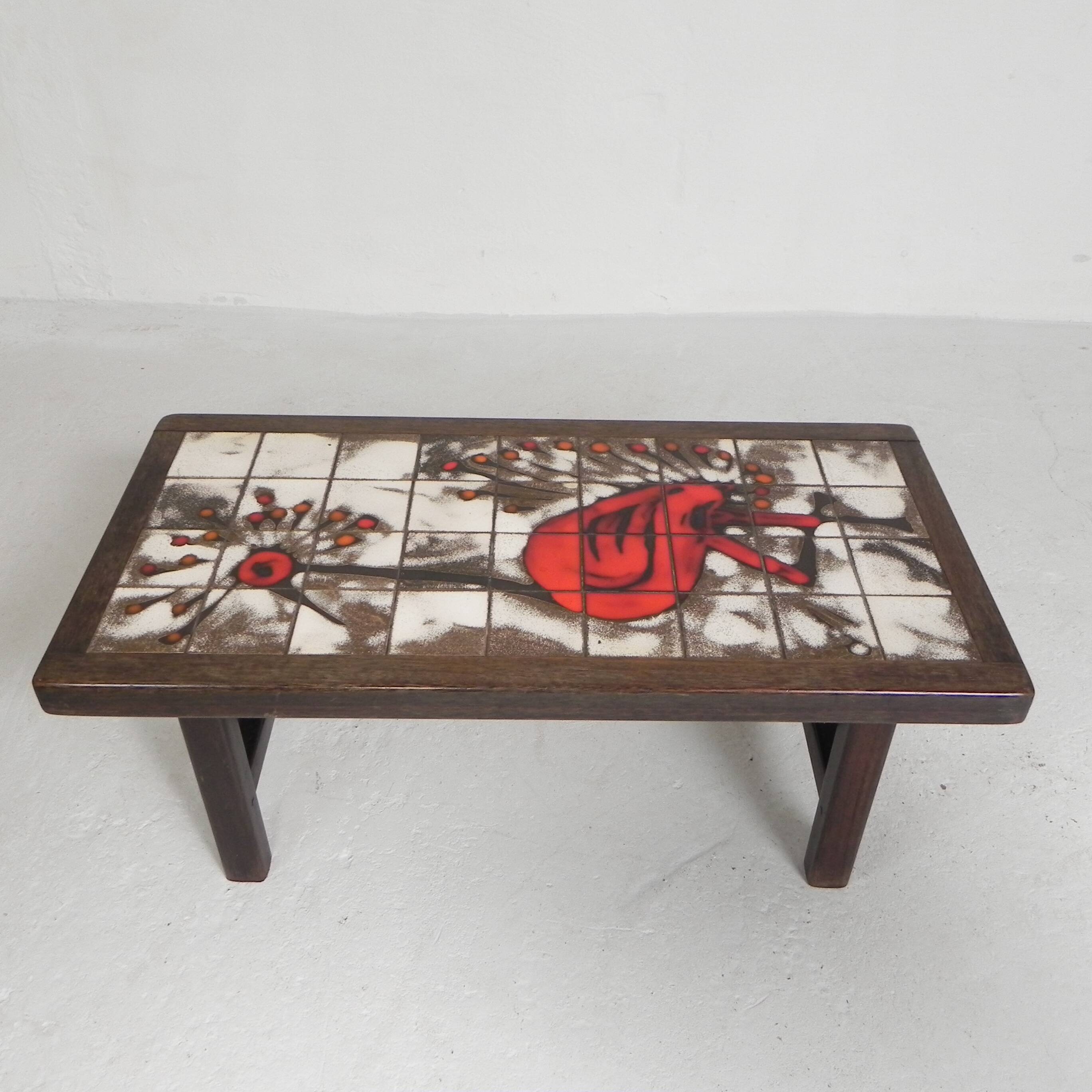 Square tile table from Vallauris, signed Dan with an image of a fantastic bird, 1960s.