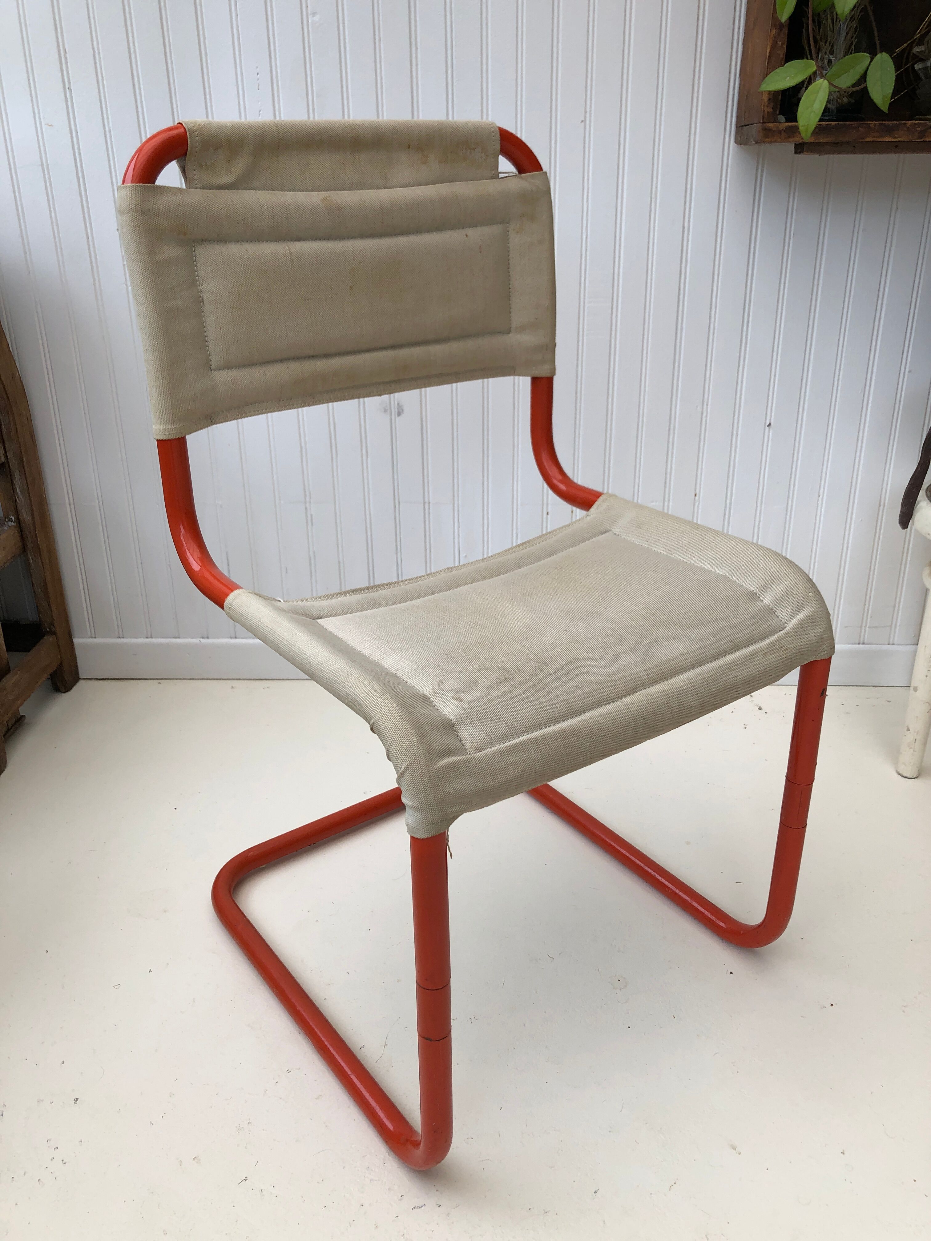 Orange tube chair