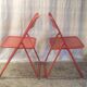 Orange metal folding chairs (set of 2) - 70s/80s