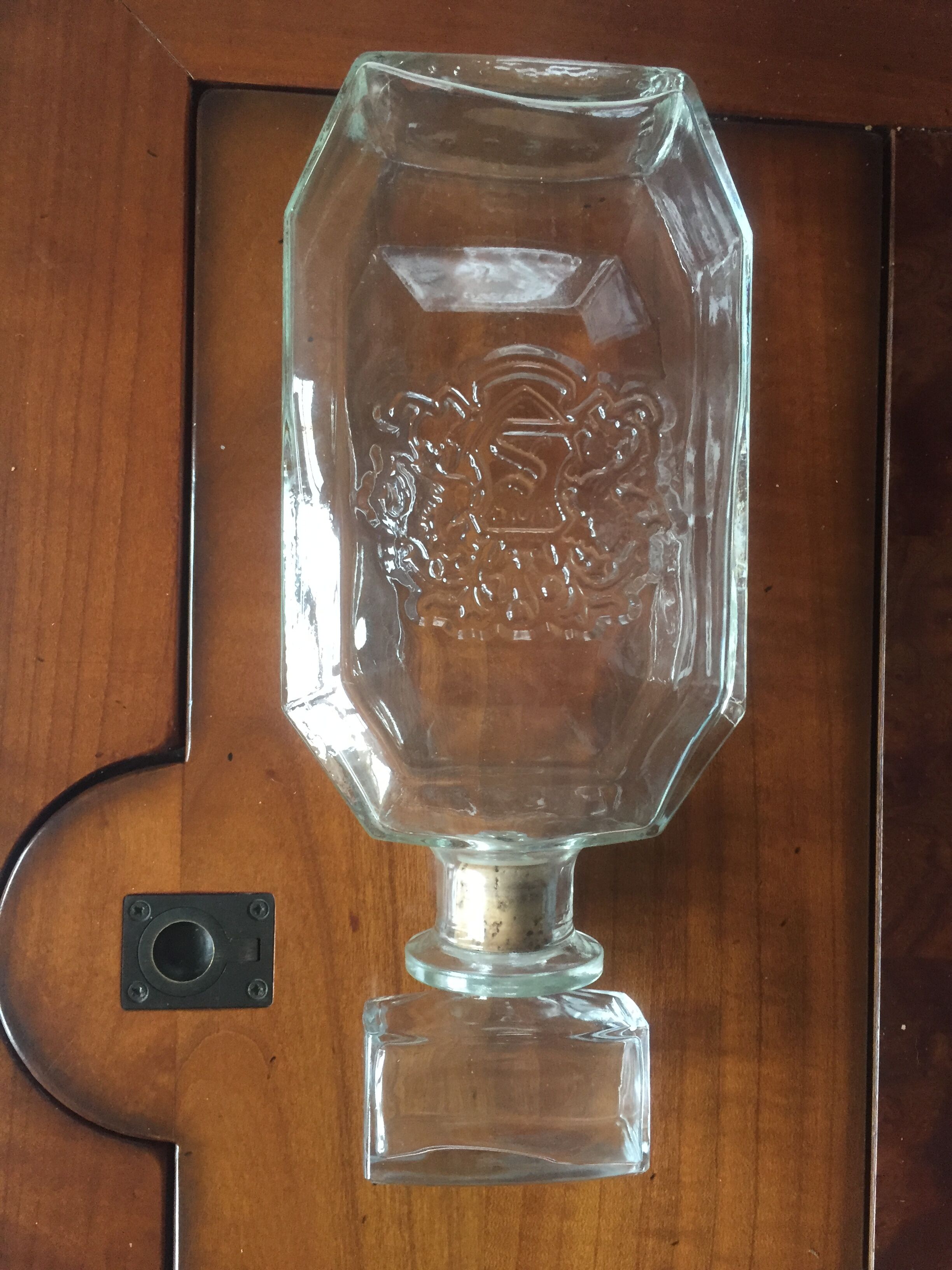 Glass bottle with coat of arms