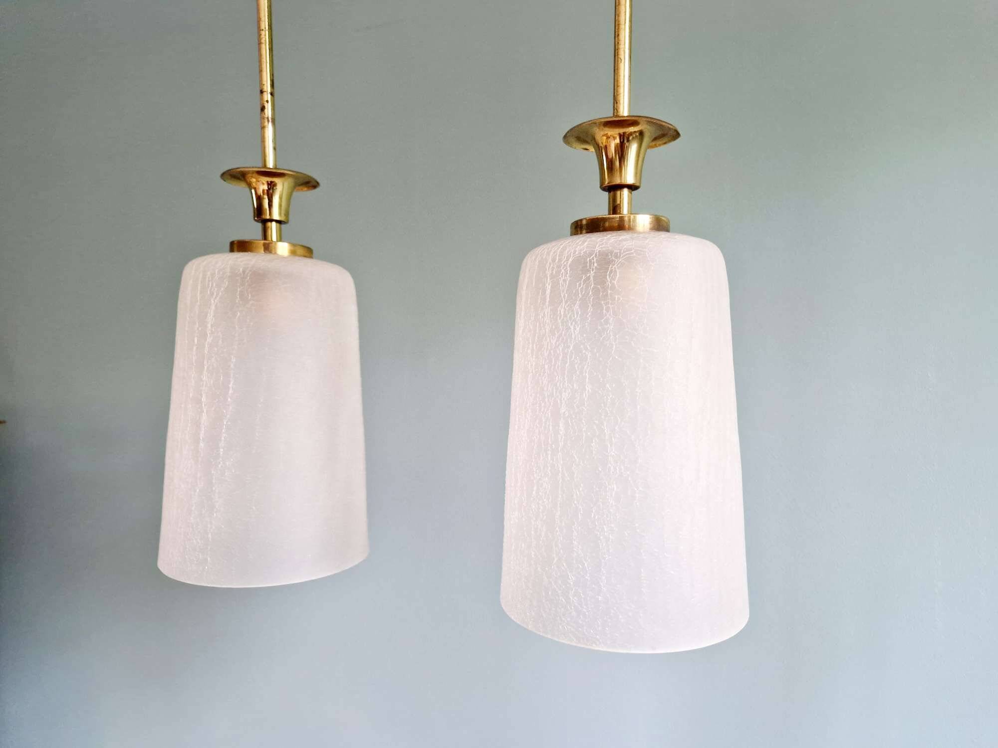 Pair of brass and cracked glass pendants, 1950-60.