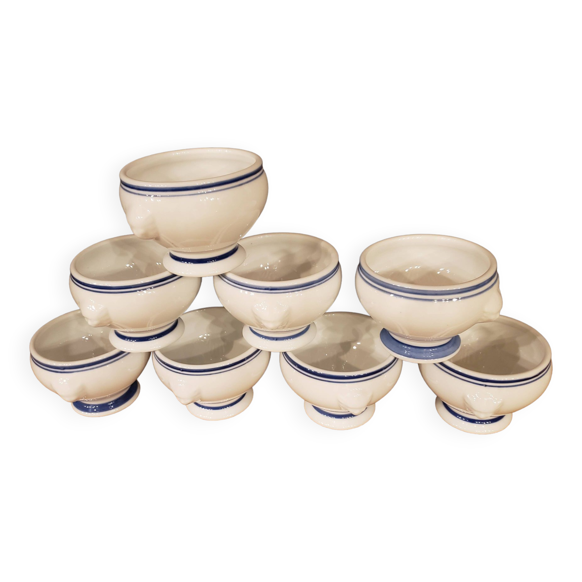8 white lion head soup bowls with blue edging