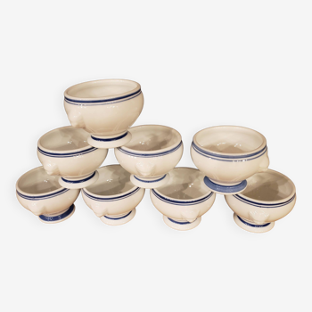 8 white lion head soup bowls with blue edging
