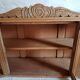Art-deco wall showcase in raw oak