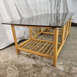 Table basse en rotin dessus verre fumé 1970