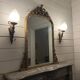 Pair of torch wall lights in Louis XVI style in 19th-century bronze.