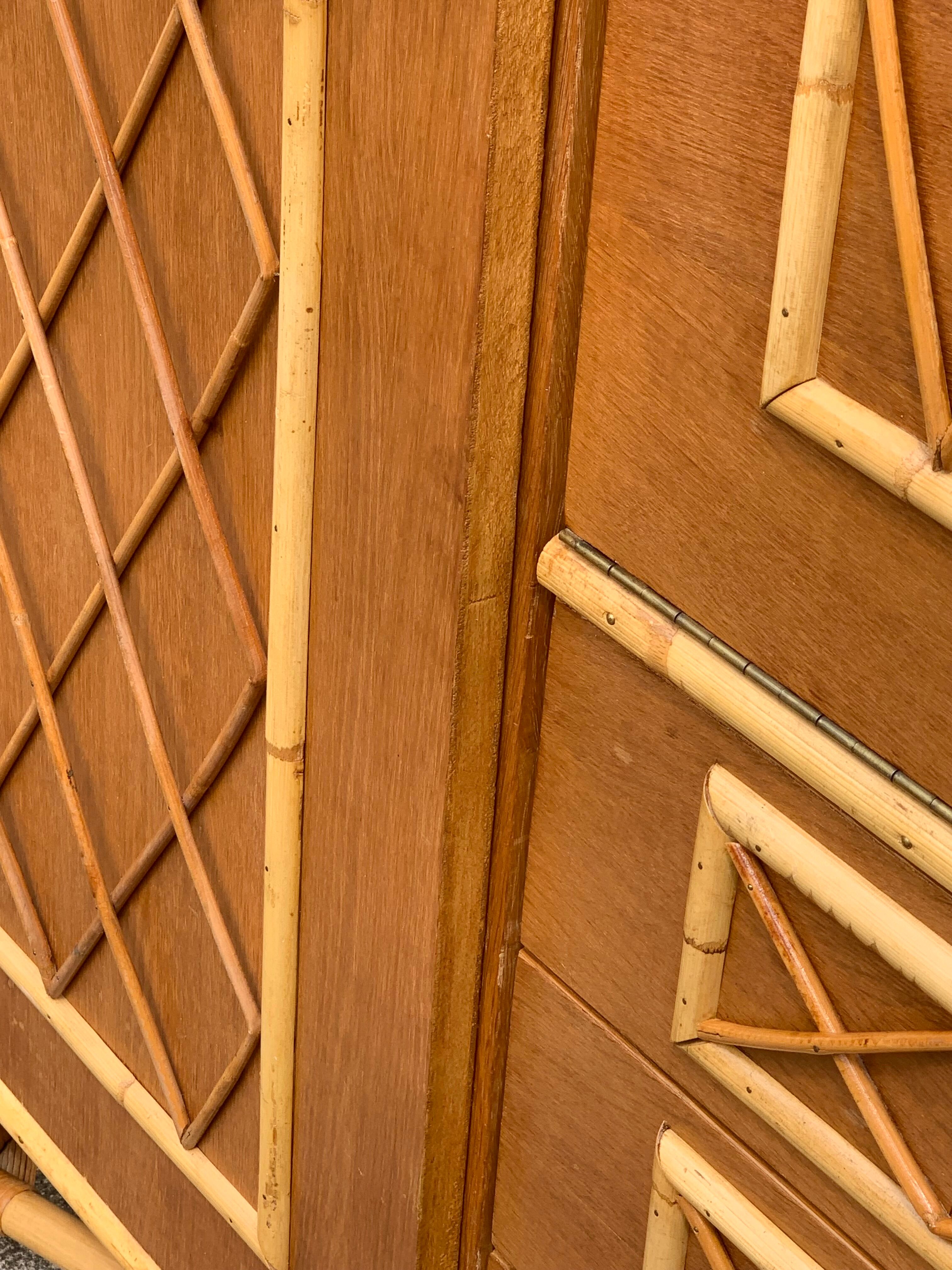 Rattan wardrobe with tapered legs from the 1960s.