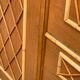 Rattan wardrobe with tapered legs from the 1960s.