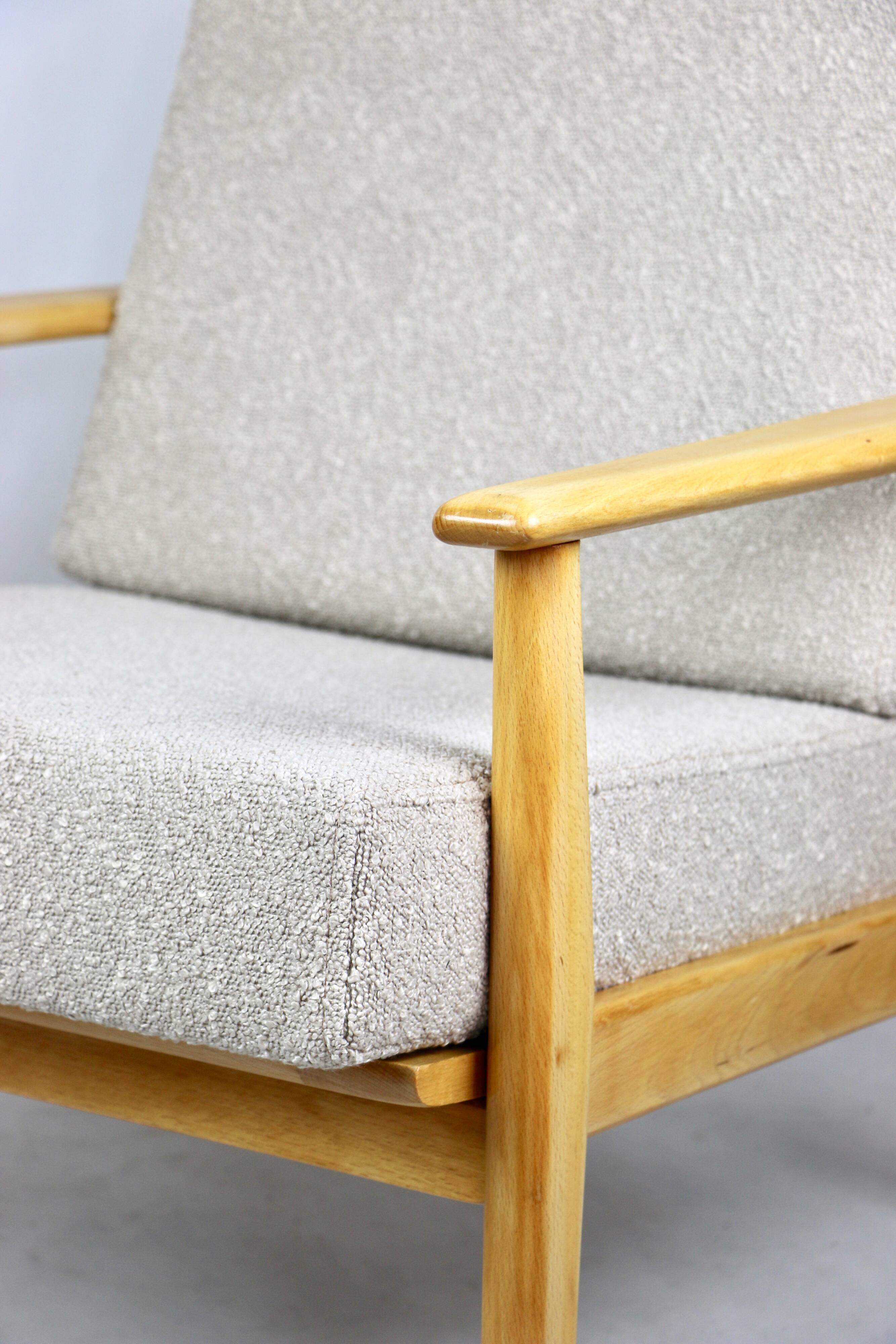 Vintage Danish armchair, 1970s, beige boucle - light wood - 2 pieces available